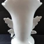 Vase with a boy with a gift Vase with a boy with a gift