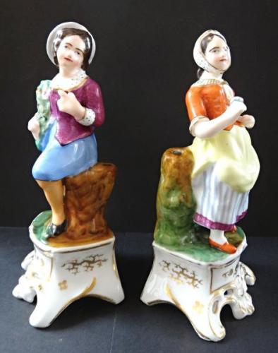 Figural pair of boy and girl on a pedestal Figural pair of boy and girl on a pedestal