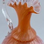 Pitcher made of milk, pink and orange glass Pitcher made of milk, pink and orange glass