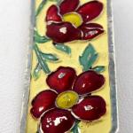 Silver brooch with red flowers and coloured enamel Silver brooch with red flowers and coloured enamel