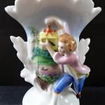 Vase with a boy with a gift Vase with a boy with a gift
