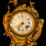 Cartel clock with angel Cartel clock with angel