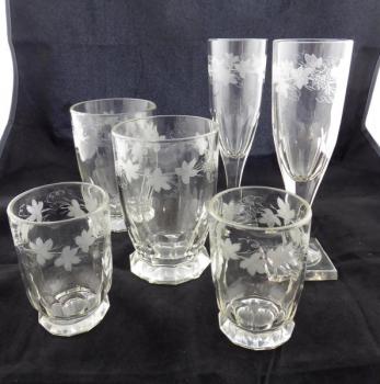 Paired glasses with vine stems Paired glasses with vine stems