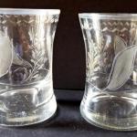 Two smaller glasses, cut floral motif Two smaller glasses, cut floral motif