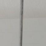 Chandelier made of white metal, with shaped balls Chandelier made of white metal, with shaped balls