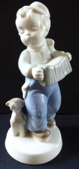 Boy with accordion and dog - Dux Boy with accordion and dog - Dux