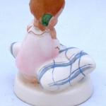 Little girl in nightgown and pillow - Royal Dux Little girl in nightgown and pillow - Royal Dux