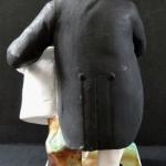 Man with beard, in frak, with white hat Man with beard, in frak, with white hat