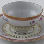 Coffee cup with pink top line and gilded ornament Coffee cup with pink top line and gilded ornament