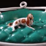 Sleeping dog on the sofa, inkwell - Klösterle Sleeping dog on the sofa, inkwell - Klösterle