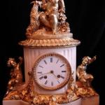 Bronze and marbel clocks