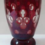 Glass, on low stem, with ruby staining