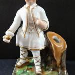 Figurine Chinese boy with a ball - stand