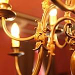 Twelve Light Chandelier - brass, patinated brass - 1960