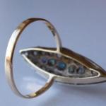 Gold and silver ring with colored stones and diamo