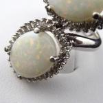 White gold ring with opals and diamonds 