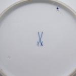 Meissen plate with golden cartouches and painted f
