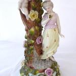 Large porcelain candlestick - Girl with cupid and 