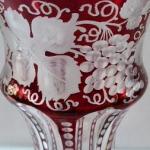 Vase with vine leaves and grapes, with ruby 
