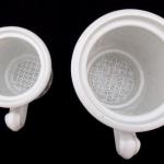 Large and smaller cup with strainer