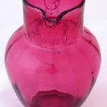 Pitcher made of pink and clear glass