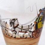 Glass shaker with horse-drawn carriage with 