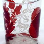 Glass with ruby staining and white painting
