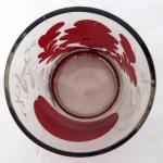 Glass with ruby staining and white painting