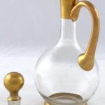 Round decanter heavily gilded