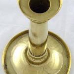 Polished brass candlestick with rings