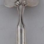 Silver shovel with figural motif