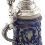 Tankard with inscription and handle with cat