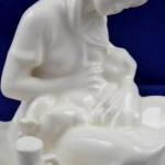 Woman with a baby - Moravian Ceramic Works