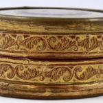 Gilded round box with flowers