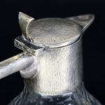 Teapot with silver mounting