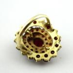 Silver gilded ring with larger garnets