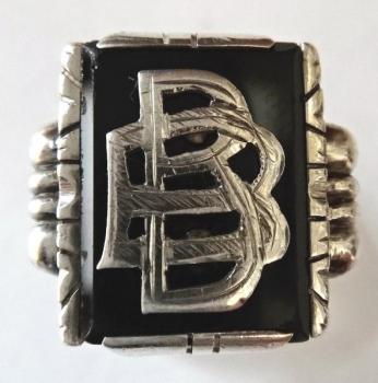 Silver ring with monogram and onyx