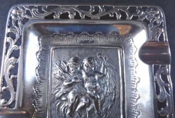 Small silver ashtray with figures