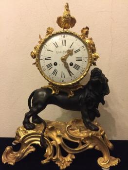 Bronze clock with lion