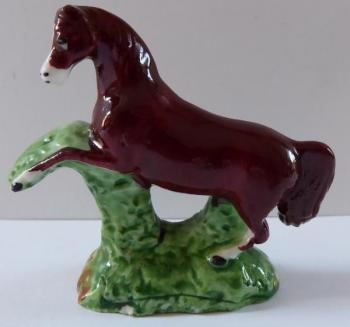 Brown painted porcelain horse