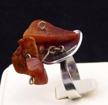 Silver ring with three natural amber