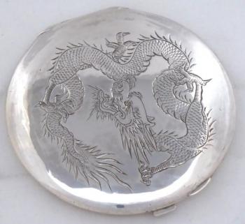 Round silver powder box with dragon