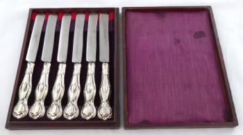 Decorative silver small knives from the period 186