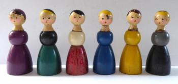 Six wooden painted dolls