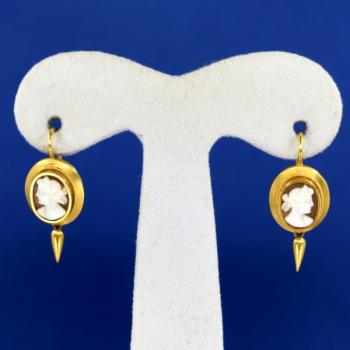Gold earrings with cameo
