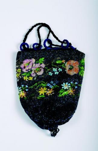 A beaded bag decorated with flowers