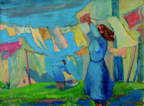 A woman hanging laundry