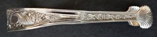 Silver sugar tongs, with an Empire ornament