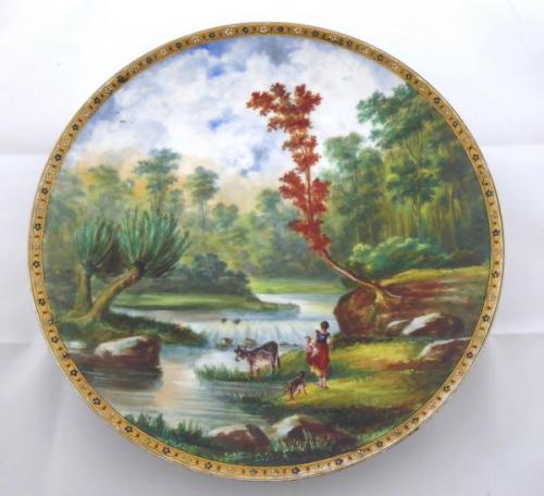 Hand-painted plate with idyllic landscape