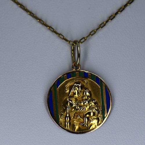 Gold pendant with our Lady